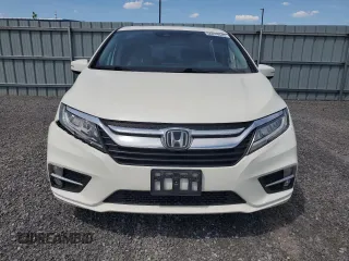 2019 Honda Odyssey Touring z VIN 5FNRL6H80KB501681, wystawiony jako Copart lot #58814945 z przebiegiem 105 287 mil mil oraz Szkoda całkowita • Salvage title. Historia ofert i sprzedaży dostępna na DreamBid. Obrazek 5.