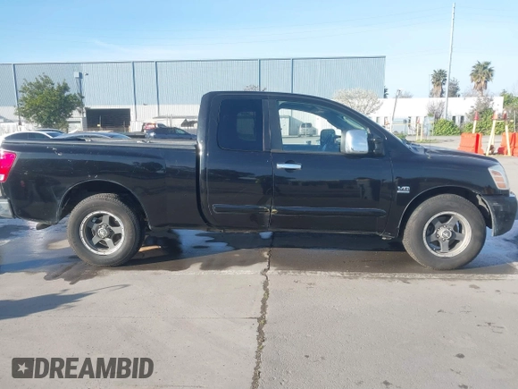2004 Nissan Titan SE with VIN 1N6AA06A14N574940, listed as a IAAI auction lot 41821005 with 202,373 mi miles. Bid and sale history available at carsss.com. Image 13.
