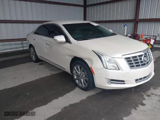 2014 Cadillac XTS Luxury with VIN 2G61M5S31E9210460, listed as a IAAI auction lot 41602087 with 1 mi miles. Bid and sale history available at carsss.com. Image 1.