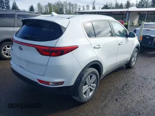 2017 Kia Sportage LX with VIN KNDPMCACXH7160726, listed as a IAAI auction lot 41974303 with 134,772 mi miles and . Bid and sale history available at DreamBid. Image 4.