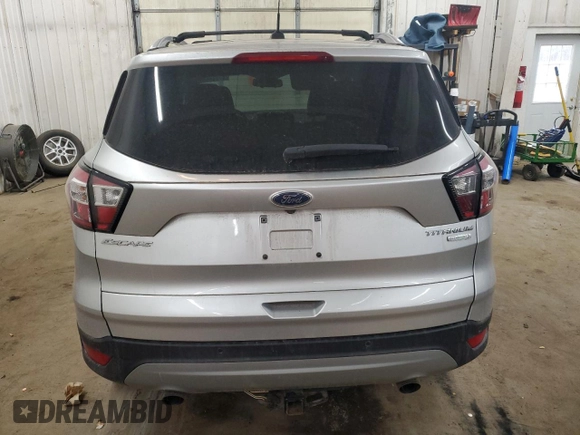 2017 Ford Escape Titanium with VIN 1FMCU0JD6HUE70200, listed as a Copart auction lot 49141595 with 92,159 mi miles and Salvage Title. Bid and sale history available at DreamBid. Image 6.