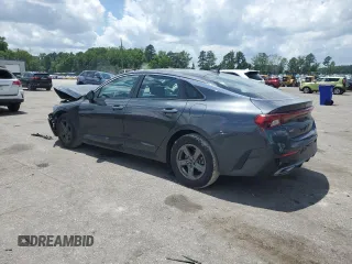 2023 Kia K5 LXS z VIN 5XXG14J21PG213387, wystawiony jako Copart lot #57720055 z przebiegiem 24 559 mil mil oraz Szkoda całkowita • Salvage title. Historia ofert i sprzedaży dostępna na DreamBid. Obrazek 2.