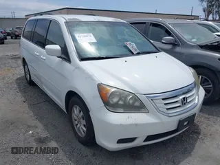 2010 Honda Odyssey EX with VIN 5FNRL3H5XAB060547, listed as a IAAI auction lot 42749876 with 228,522 mi miles and . Bid and sale history available at DreamBid. Image 1.