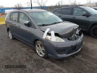 2010 Mazda 5 Sport with VIN JM1CR2WLXA0370650, listed as a IAAI auction lot 41602072 with 142,611 mi miles and . Bid and sale history available at DreamBid. Image 1.