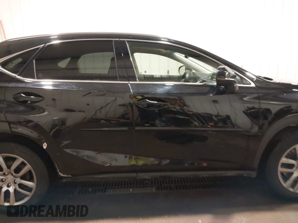 2015 Lexus NX 200t with VIN JTJBARBZ1F2004476, listed as a IAAI auction lot 41668982 with 110,512 mi miles and . Bid and sale history available at DreamBid. Image 13.