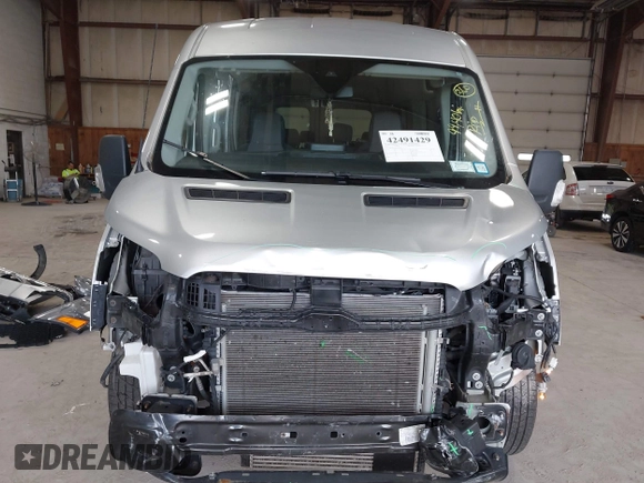2021 Ford Transit Passenger XL с VIN 1FBAX9CG9MKA15625, выставлен на аукционе IAAI как лот 42491429 с пробегом 99 401 миль миль и . История ставок и продаж доступна на DreamBid. Изображение 6.