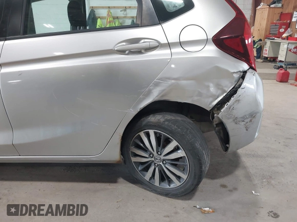 2015 Honda Fit EX-L z VIN 3HGGK5H86FM714030, wystawiony jako IAAI lot #42388380 z przebiegiem 197 414 mil mil oraz . Historia ofert i sprzedaży dostępna na DreamBid. Obrazek 6.
