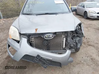 2009 Kia Sportage LX with VIN KNDJF724997570871, listed as a IAAI auction lot 41003267 with 231,654 mi miles and . Bid and sale history available at carsss.com. Image 6.