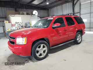 2011 Chevrolet Tahoe LS with VIN 1GNSCAE00BR320455, listed as a Copart auction lot 54782325 with 202,936 mi miles and Salvage title. Bid and sale history available at DreamBid. Image 1.