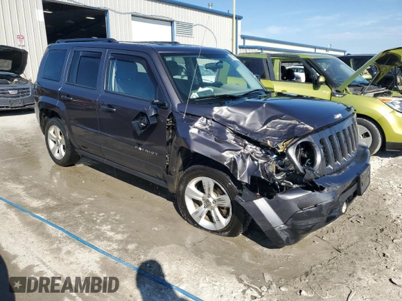 2014 Jeep Patriot Latitude with VIN 1C4NJRFB1ED847612, listed as a Copart auction lot 62721605 with 126,268 mi miles and Salvage title. Bid and sale history available at DreamBid. Image 4.