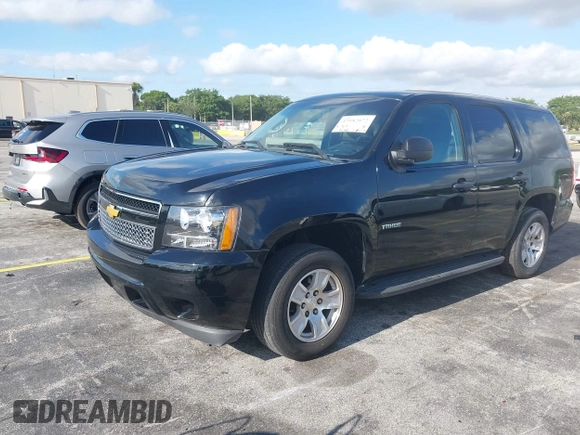 2013 Chevrolet Tahoe Commercial z VIN 1GNLC2E05DR218100, wystawiony jako IAAI lot #42182072 z przebiegiem 162 888 mil mil oraz . Historia ofert i sprzedaży dostępna na DreamBid. Obrazek 2.