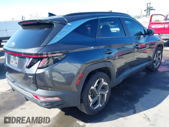 2022 Hyundai Tucson SEL with VIN 5NMJCCAEXNH061242, listed as a IAAI auction lot 41866145 with 63,501 mi miles and . Bid and sale history available at carsss.com. Image 4.