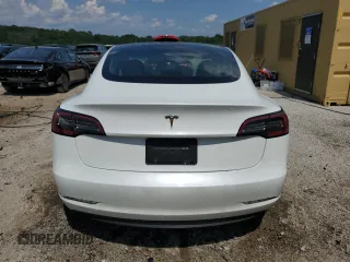 2023 Tesla Model 3 с VIN 5YJ3E1EA7PF447006, выставлен на аукционе Copart как лот 62788355 с пробегом 134 951 миль миль и Чистый • Clean title. История ставок и продаж доступна на DreamBid. Изображение 6.
