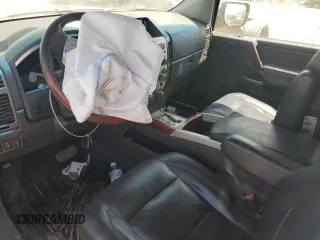 2006 Infiniti QX56 with VIN 5N3AA08C26N811121, listed as a Copart auction lot 64007304 with 0 mi miles and Salvage Title. Bid and sale history available at carsss.com. Image 8.