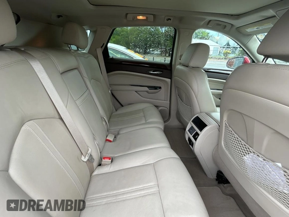 2015 Cadillac SRX Luxury Collection z VIN 3GYFNBE37FS569840, wystawiony jako Copart lot #56965835 z przebiegiem 183 817 mil mil oraz Tytuł czysty. Historia ofert i sprzedaży dostępna na DreamBid. Obrazek 6.