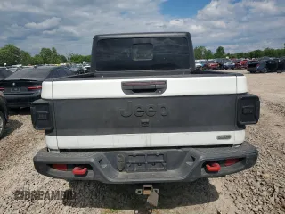 2020 Jeep Gladiator Overland z VIN 1C6HJTFG6LL135872, wystawiony jako Copart lot #59249895 z przebiegiem 113 519 mil mil oraz Czysty tytuł • Clean title. Historia ofert i sprzedaży dostępna na DreamBid. Obrazek 6.