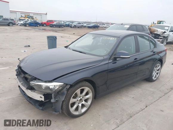 2015 BMW 3 Series 328i xDrive with VIN WBA3B3C54FJ984107, listed as a IAAI auction lot 41565829 with 98,557 mi miles and . Bid and sale history available at DreamBid. Image 2.