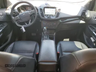 2019 Ford Escape Titanium z VIN 1FMCU0J92KUB62184, wystawiony jako Copart lot #63027765 z przebiegiem 136 005 mil mil oraz Czysty tytuł • Clean title. Historia ofert i sprzedaży dostępna na DreamBid. Obrazek 8.