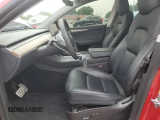 2022 Tesla Model Y Performance with VIN 7SAYGDEF8NF514662, listed as a Copart auction lot 60230305 with 81,926 mi miles and Salvage title. Bid and sale history available at DreamBid. Image 7.