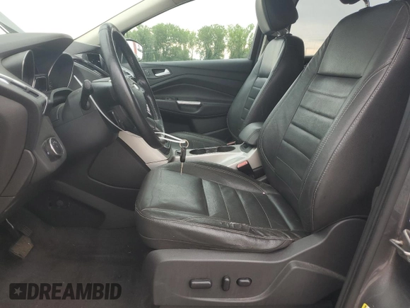 2013 Ford Escape SEL z VIN 1FMCU9HX7DUC11052, wystawiony jako Copart lot #62377515 z przebiegiem 225 704 mil mil oraz Szkoda całkowita • Salvage title. Historia ofert i sprzedaży dostępna na DreamBid. Obrazek 7.