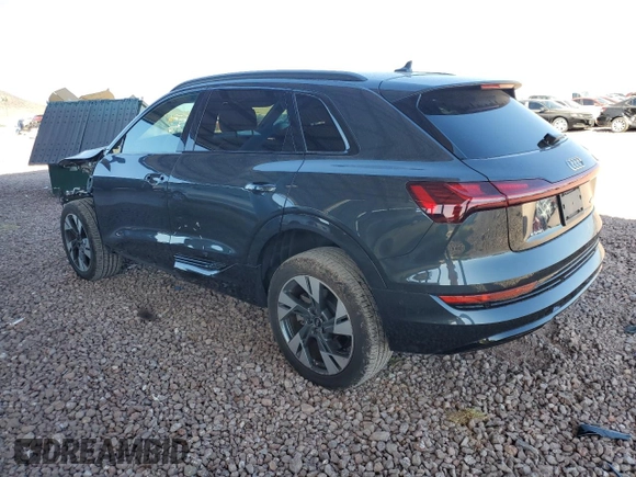 2023 Audi e-tron Premium with VIN WA1AAAGE3PB023323, listed as a Copart auction lot 69809524 with 31,564 mi miles and Salvage Title. Bid and sale history available at DreamBid. Image 2.