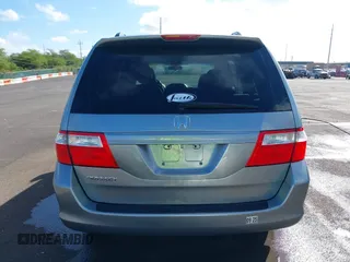 2007 Honda Odyssey EX-L with VIN 5FNRL38677B021464, listed as a IAAI auction lot 41568582 with 131,359 mi miles and . Bid and sale history available at DreamBid. Image 16.
