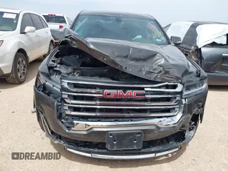 2020 GMC Acadia SLE z VIN 1GKKNKLAXLZ166105, wystawiony jako IAAI lot #42083075 z przebiegiem 81 920 mil mil oraz . Historia ofert i sprzedaży dostępna na DreamBid. Obrazek 12.