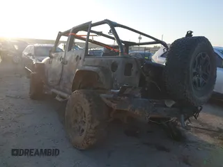 2014 Jeep Wrangler Unlimited Rubicon with VIN 1C4HJWFG8EL159345, listed as a IAAI auction lot 41846272 with Not provided miles and . Bid and sale history available at DreamBid. Image 3.