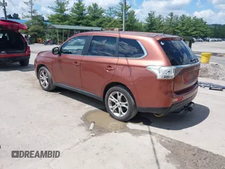 2014 Mitsubishi Outlander GT with VIN JA4JZ4AX6EZ006606, listed as a IAAI auction lot 42640681 with 161,904 mi miles and . Bid and sale history available at DreamBid. Image 3.