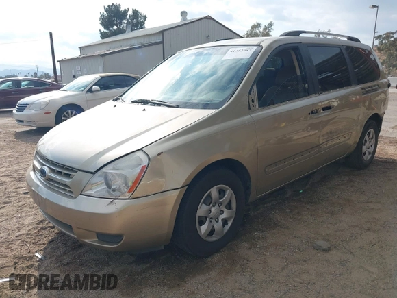 2009 Kia Sedona LX with VIN KNDMB233996303544, listed as a IAAI auction lot 41352987 with 230,510 mi miles. Bid and sale history available at carsss.com. Image 2.