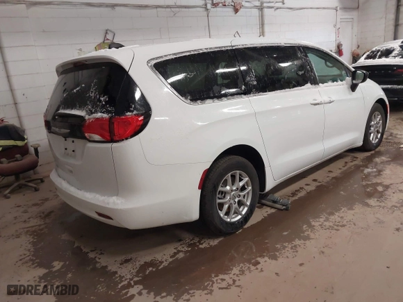 2024 Chrysler Voyager LX with VIN 2C4RC1CG6RR108087, listed as a IAAI auction lot 41894597 with 3,062 mi miles. Bid and sale history available at carsss.com. Image 4.