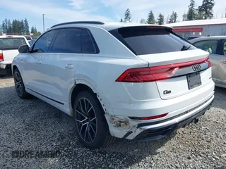 2023 Audi Q8 Premium Plus with VIN WA1EVBF17PD021816, listed as a IAAI auction lot 42024241 with 26,240 mi miles and . Bid and sale history available at DreamBid. Image 3.