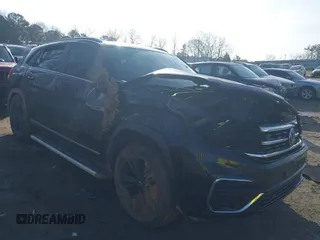 2021 Volkswagen Atlas SE z VIN 1V2RE2CA8MC201494, wystawiony jako IAAI lot #41498075 z przebiegiem 67 687 mil mil oraz . Historia ofert i sprzedaży dostępna na DreamBid. Obrazek 1.