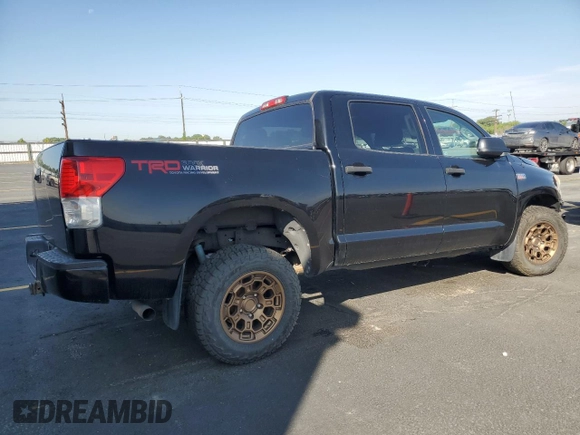 2012 Toyota Tundra with VIN 5TFDY5F14CX214234, listed as a Copart auction lot 60472275 with 205,225 mi miles and Salvage title. Bid and sale history available at DreamBid. Image 3.