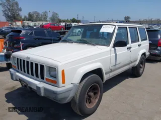 2000 Jeep Cherokee z VIN 1J4FT48S8YL214074, wystawiony jako IAAI lot #42577235 z przebiegiem 287 868 mil mil oraz . Historia ofert i sprzedaży dostępna na DreamBid. Obrazek 2.
