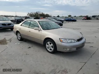1997 Lexus ES 300 Luxury Sport Sdn with VIN JT8BF22GXV0046390, listed as a Copart auction lot 82545064 with 113,442 mi miles and Salvage Title. Bid and sale history available at carsss.com. Image 4.