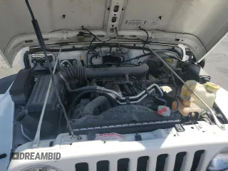 2000 Jeep Wrangler Sahara with VIN 1J4FA59S6YP790541, listed as a Copart auction lot 53837885 with 137,827 mi miles and Salvage title. Bid and sale history available at DreamBid. Image 11.
