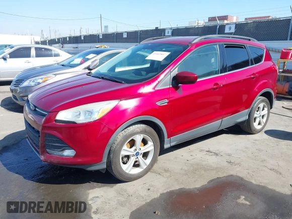 2015 Ford Escape SE with VIN 1FMCU0GX3FUC80207, listed as a IAAI auction lot 41665897 with 153,891 mi miles. Bid and sale history available at carsss.com. Image 2.