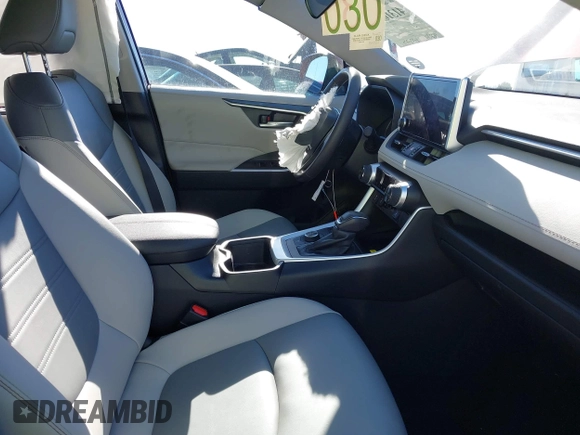 2024 Toyota RAV4 Hybrid XLE Premium with VIN 4T3B6RFVXRU166145, listed as a IAAI auction lot 41310813 with 8,276 mi miles and . Bid and sale history available at DreamBid. Image 5.