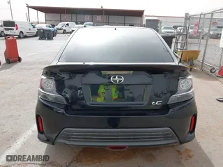 2016 Scion tC with VIN JTKJF5C76GJ017584, listed as a IAAI auction lot 41938981 with 121,166 mi miles. Bid and sale history available at carsss.com. Image 16.