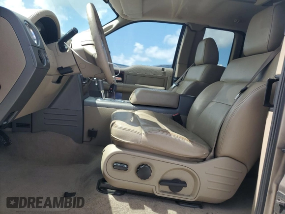 2005 Ford F-150 XLT with VIN 1FTRX12585FA42177, listed as a Copart auction lot 64841645 with 153,779 mi miles and Salvage title. Bid and sale history available at DreamBid. Image 7.