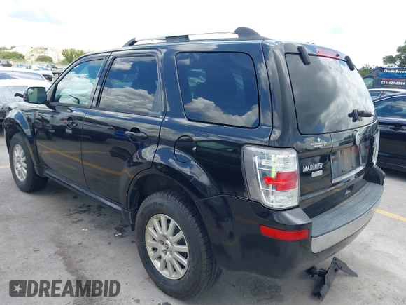 2011 Mercury Mariner Premier with VIN 4M2CN8HGXBKJ07489, listed as a IAAI auction lot 42574942 with 163,786 mi miles and . Bid and sale history available at DreamBid. Image 3.