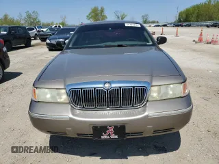 2001 Mercury Grand Marquis LS z VIN 2MEFM75W11X612617, wystawiony jako Copart lot #54782295 z przebiegiem 171 944 mil mil oraz Szkoda całkowita • Salvage title. Historia ofert i sprzedaży dostępna na DreamBid. Obrazek 5.