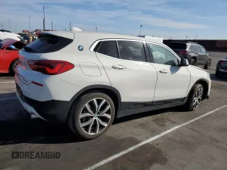 2020 BMW X2 xDrive28i with VIN WBXYJ1C02L5P85780, listed as a Copart auction lot 43665555 with 14,451 mi miles and Salvage Title. Bid and sale history available at carsss.com. Image 3.