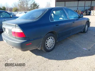 1996 Honda Accord EX w/Leather with VIN 1HGCD566XTA251134, listed as a IAAI auction lot 41461247 with 230,793 mi miles. Bid and sale history available at carsss.com. Image 4.