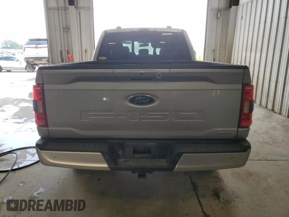 2021 Ford F-150 XL with VIN 1FTFW1E85MKE03933, listed as a Copart auction lot 60513185 with 82,793 mi miles and Salvage title. Bid and sale history available at DreamBid. Image 6.
