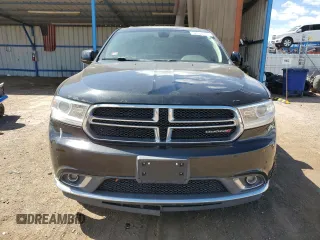 2014 Dodge Durango SXT with VIN 1C4RDJAG1EC972595, listed as a Copart auction lot 57133105 with 126,011 mi miles and Clean title. Bid and sale history available at DreamBid. Image 5.