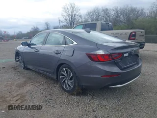 2021 Honda Insight Touring with VIN 19XZE4F91ME005517, listed as a IAAI auction lot 42036493 with 65,404 mi miles and . Bid and sale history available at carsss.com. Image 3.