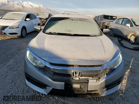 2016 Honda Civic Sedan LX with VIN 19XFC2F57GE213772, listed as a Copart auction lot 43185345 with 142,588 mi miles and Salvage Title. Bid and sale history available at carsss.com. Image 5.