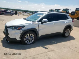 2023 Toyota Corolla Cross LE z VIN 7MUCAAAG4PV070612, wystawiony jako Copart lot #58989675 z przebiegiem 11 807 mil mil oraz Szkoda całkowita • Salvage title. Historia ofert i sprzedaży dostępna na DreamBid. Obrazek 1.